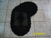 tapete oval preto